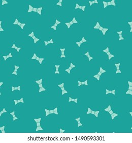 Green Bow tie icon isolated seamless pattern on green background.  Vector Illustration