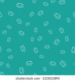 Green Brass knuckles icon isolated seamless pattern on green background.  Vector Illustration