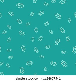 Green Brass knuckles icon isolated seamless pattern on green background.  Vector Illustration