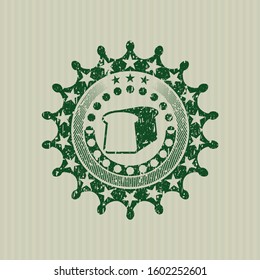 Green bread icon inside distress rubber seal