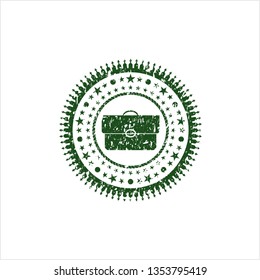 Green briefcase icon inside distress rubber seal with grunge texture