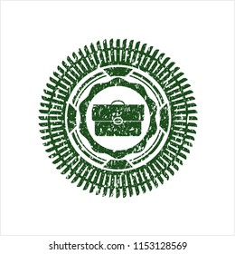Green briefcase icon inside grunge style stamp