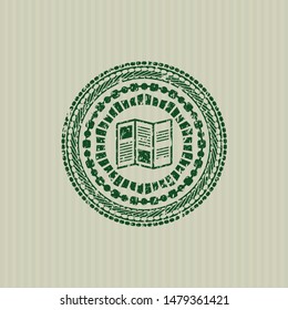 Green brochure icon inside distress rubber texture
