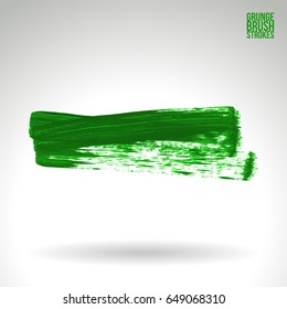 Green brush stroke and texture. Grunge vector abstract hand - painted element. Underline and border design.