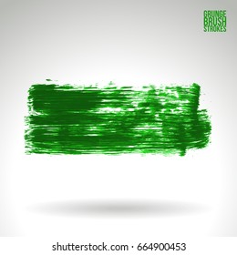 Green brush stroke and texture. Grunge vector abstract hand - painted element. Underline and border design.