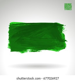 Green brush stroke and texture. Grunge vector abstract hand - painted element. Underline and border design.