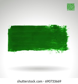 Green brush stroke and texture. Grunge vector abstract hand - painted element. Underline and border design.