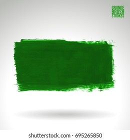 Green brush stroke and texture. Grunge vector abstract hand - painted element. Underline and border design.