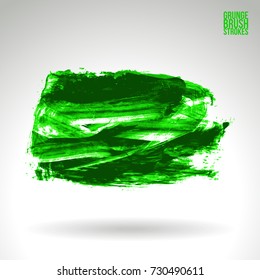 Green brush stroke and texture. Grunge vector abstract hand - painted element. Underline and border design.