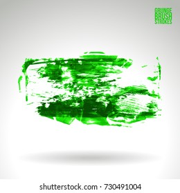 Green brush stroke and texture. Grunge vector abstract hand - painted element. Underline and border design.