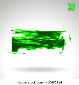 Green brush stroke and texture. Grunge vector abstract hand - painted element. Underline and border design.