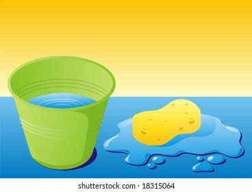 Green bucket with water and sponge with water splash