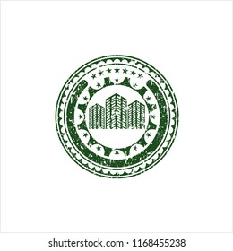 Green buildings icon inside rubber grunge texture stamp