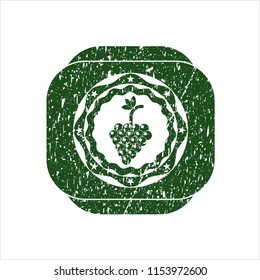 Green bunch of grapes icon inside distress rubber grunge texture seal