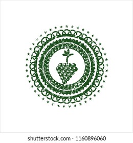 Green bunch of grapes icon inside distress rubber seal with grunge texture