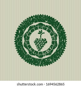 Grüner Strauß mit Weintraubensymbol innerhalb einer bedrückten Grunge-Stempelmarke