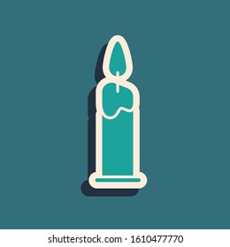 Green Burning candle in candlestick icon isolated on blue background. Cylindrical candle stick with burning flame. Long shadow style. Vector Illustration