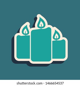 Green Burning candles icon isolated on blue background. Old fashioned lit candles. Cylindrical aromatic candle sticks with burning flames. Long shadow style. Vector Illustration