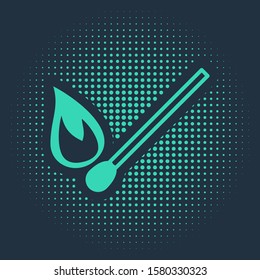 Green Burning match with fire icon isolated on blue background. Match with fire. Matches sign. Abstract circle random dots. Vector Illustration