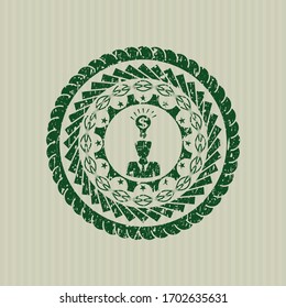 Green business idea icon inside rubber stamp with grunge texture. 