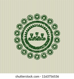 Green business teamwork icon inside distressed grunge stamp