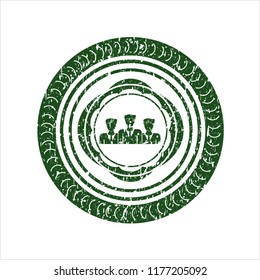 Green business teamwork icon inside distressed rubber seal