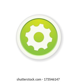 The green button with the setting symbol / the glossy setting button / the cogwheel icon