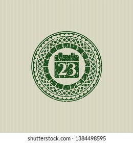 Green calendar icon inside distressed rubber stamp