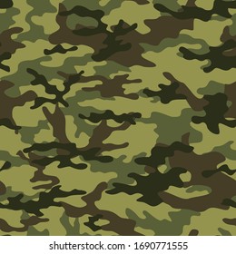 
Green camouflage pattern military texture on textile. Repeat print. Fashionable background. Vector