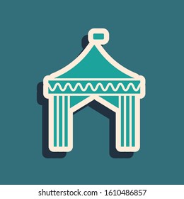 Green Camping tent icon isolated on blue background. Carnival camping tent. Amusement park. Long shadow style. Vector Illustration