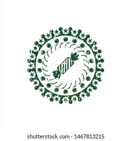 Green candy icon inside distress rubber seal