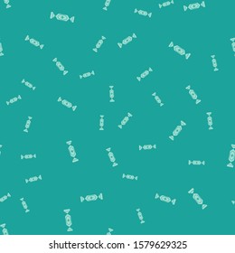 Green Candy icon isolated seamless pattern on green background. Merry Christmas and Happy New Year.  Vector Illustration