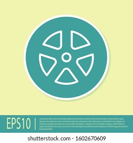 Green Car wheel icon isolated on yellow background.  Vector Illustration