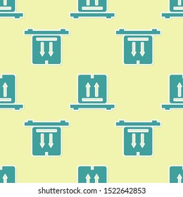 Green Cardboard boxes on pallet icon isolated seamless pattern on yellow background. Closed carton delivery packaging box with fragile signs.  Vector Illustration
