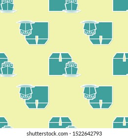 Green Cargo ship with boxes delivery service icon isolated seamless pattern on yellow background. Delivery, transportation. Freighter with parcels, boxes, goods.  Vector Illustration