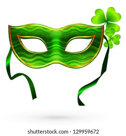 Green carnival mask with clovers