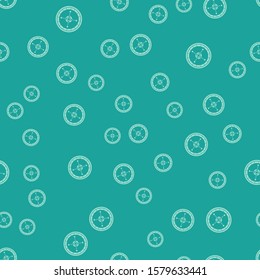 Green Casino roulette wheel icon isolated seamless pattern on green background.  Vector Illustration