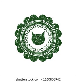 Green cat face icon inside distress rubber grunge seal