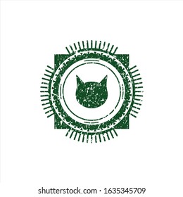 Green cat face icon inside grunge style stamp