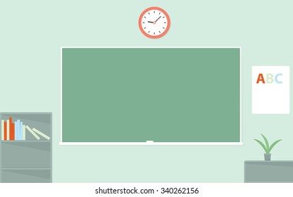 Green chalkboard. Empty schoolroom