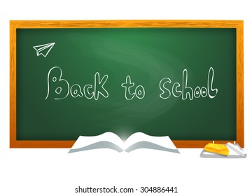 Green chalkboard with school supplies - back to school concept
