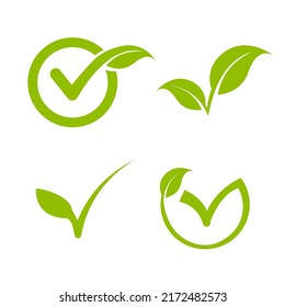 Green check mark with a leaf. Eco logo template. Ecology vegan organic symbol. Vector illustration isolated on white background.