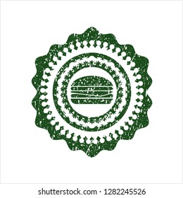 Green cheeseburger icon inside distressed rubber texture