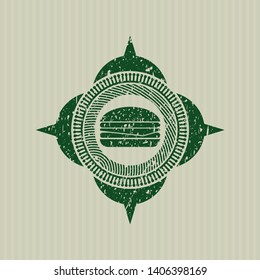 Green cheeseburger icon inside distressed rubber texture