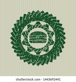 Green cheeseburger icon inside distressed grunge seal
