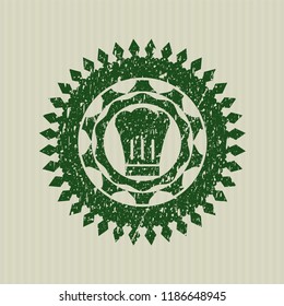 Green chef hat icon inside rubber grunge texture stamp
