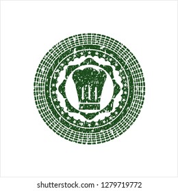 Green chef hat icon inside rubber stamp with grunge texture