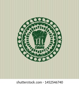 Green chef hat icon inside rubber grunge stamp