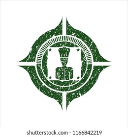 Green chef icon inside distressed rubber grunge texture stamp