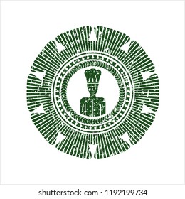 Green chef icon inside distressed rubber stamp with grunge texture